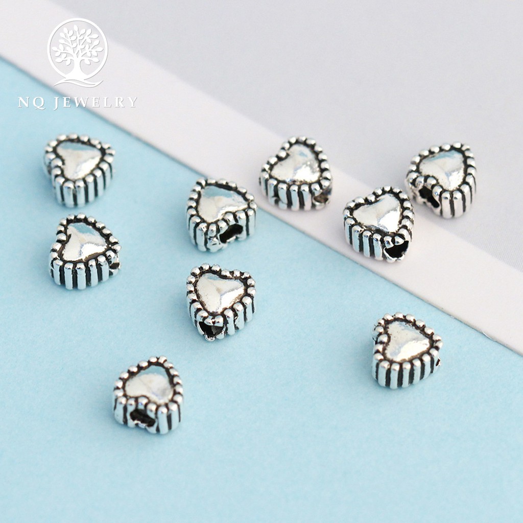 Charm bạc trái tim xỏ ngang - NQ Jewelry