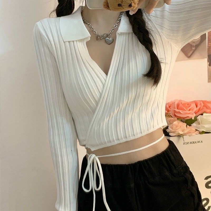 Áo kiểu có cổ đắp chéo tay dài cuốn dây eo