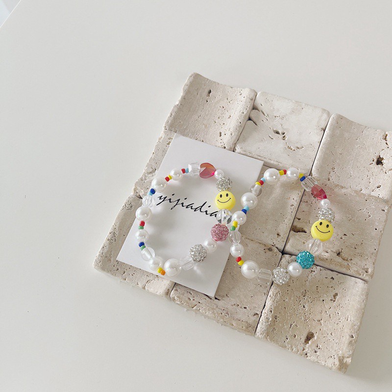 Vòng Tay Chuỗi Hạt Ngọc Trai Mặt Cười Hoạt Hình Cho Nữ