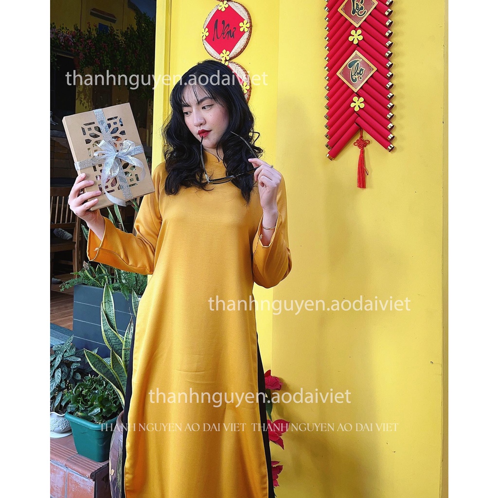 Áo dài vàng dáng suông truyền thống lụa Tây Thi