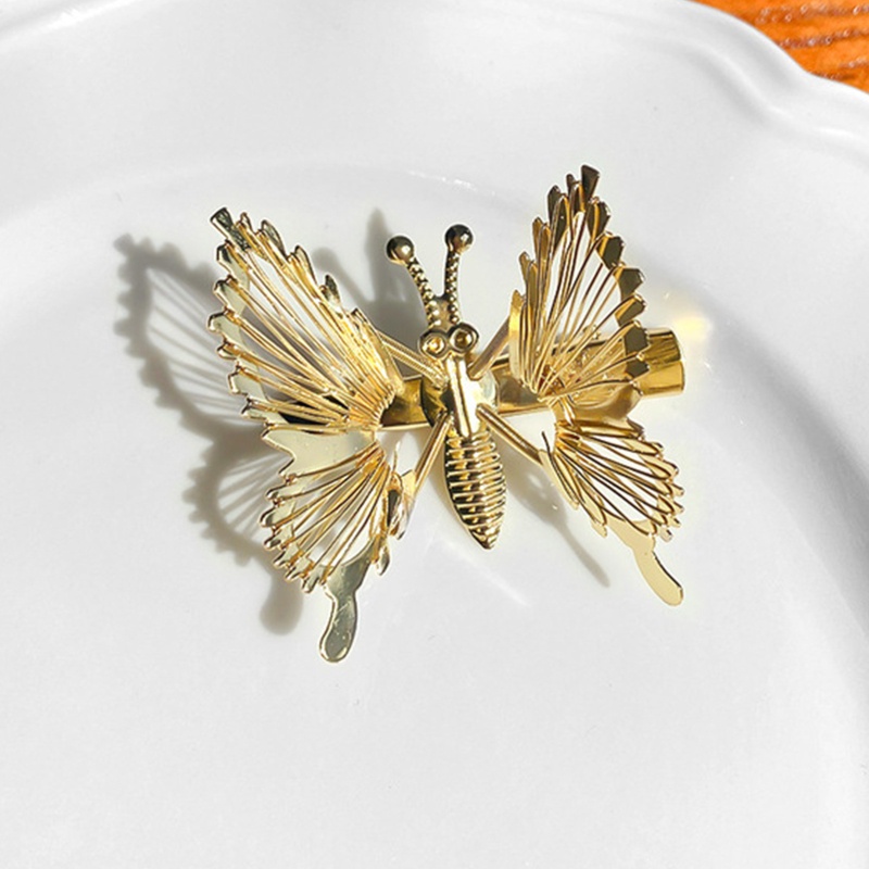 Kẹp Tóc Tua Rua Hình Cánh Bướm Đính Ngọc Trai Cho Nữ