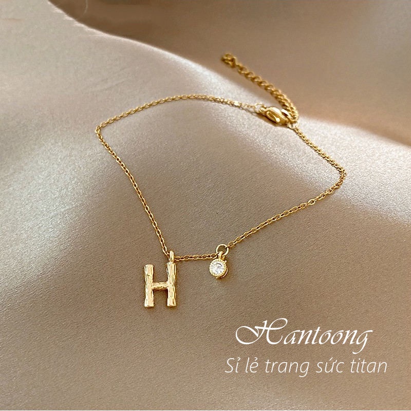 Vòng tay titan nữ mặt chữ H thiết kế thời trang thanh lịch