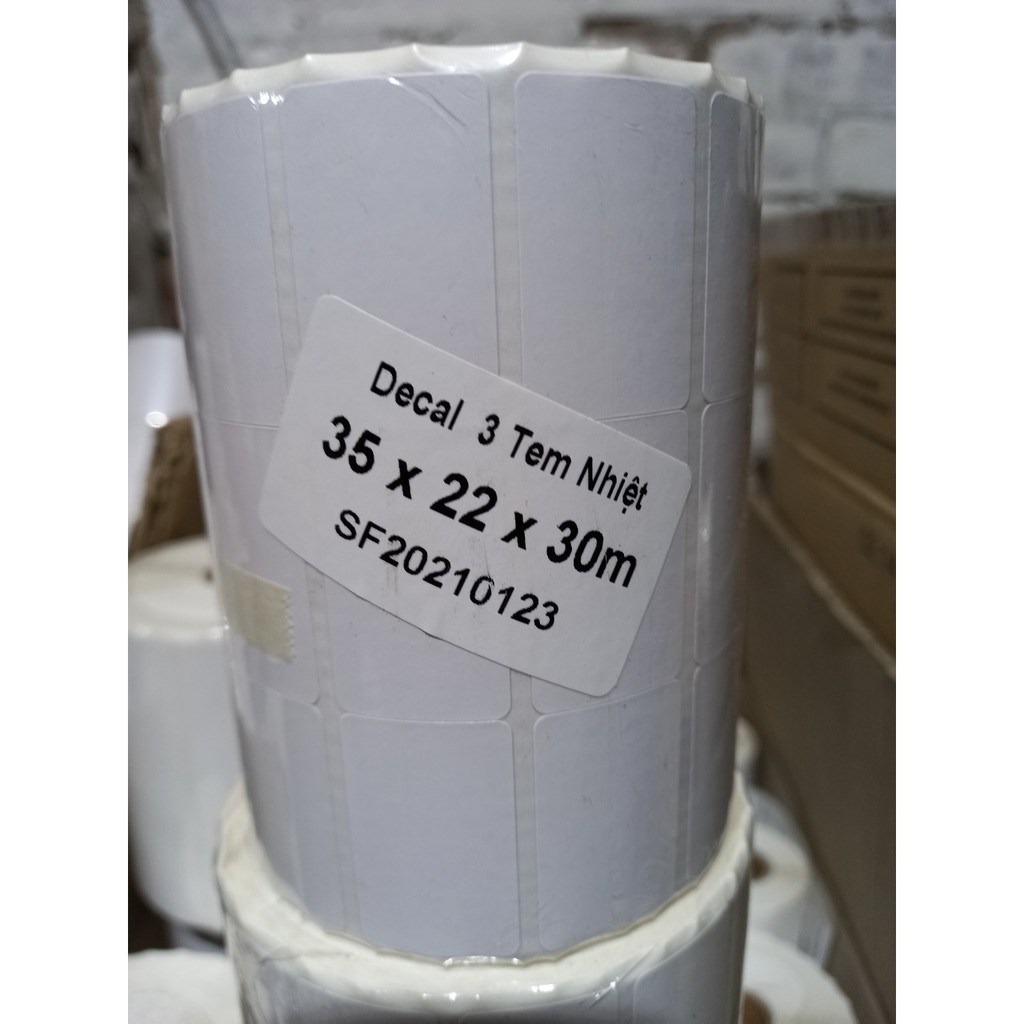 Giấy in nhiệt . In tem Mã Vạch 35x22x30m cuộn 2hàng /3hàng tem