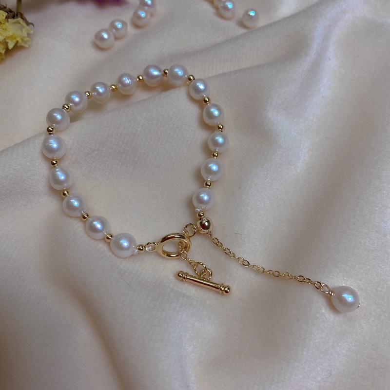 Vòng tay hạt tròn đều màu trắng ánh hồng 8ly