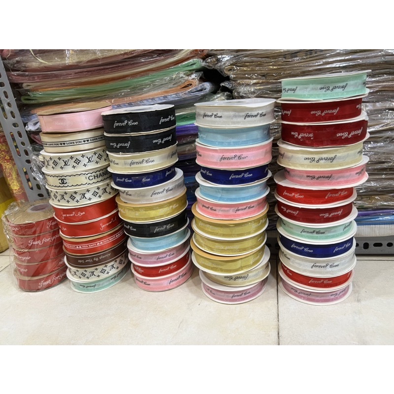 Ruy băng 2 phân in chữ loại tốt dài 50m