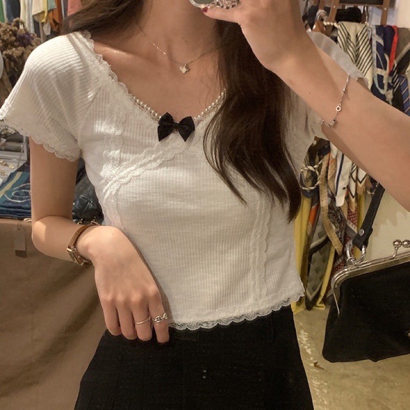 Set áo croptop trắng nơ ngực phối ren + chân váy xếp li cách điệu ulzzang Hàn Quốc [Yannie]
