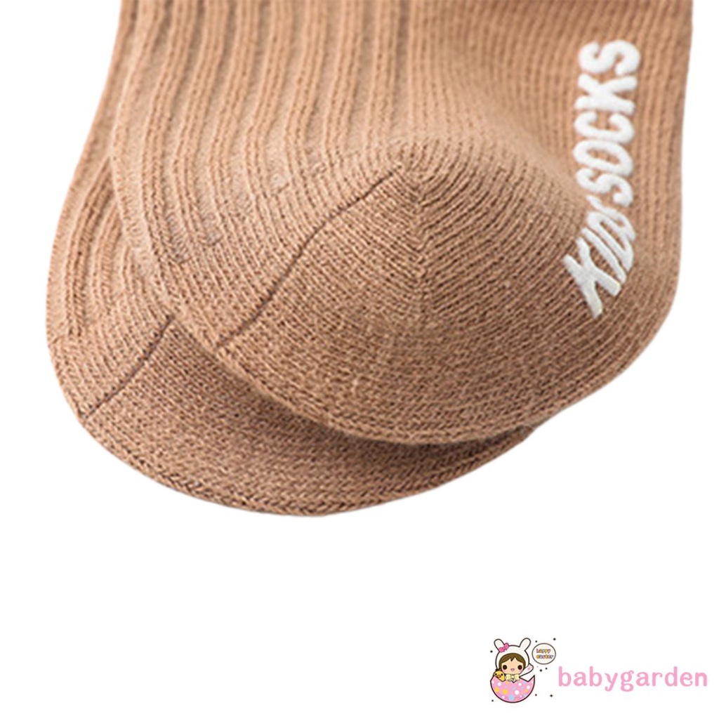 Tất dệt kim bằng vải gân màu trơn chống trượt phối ren gợn sóng ở viền cổ cho bé gái