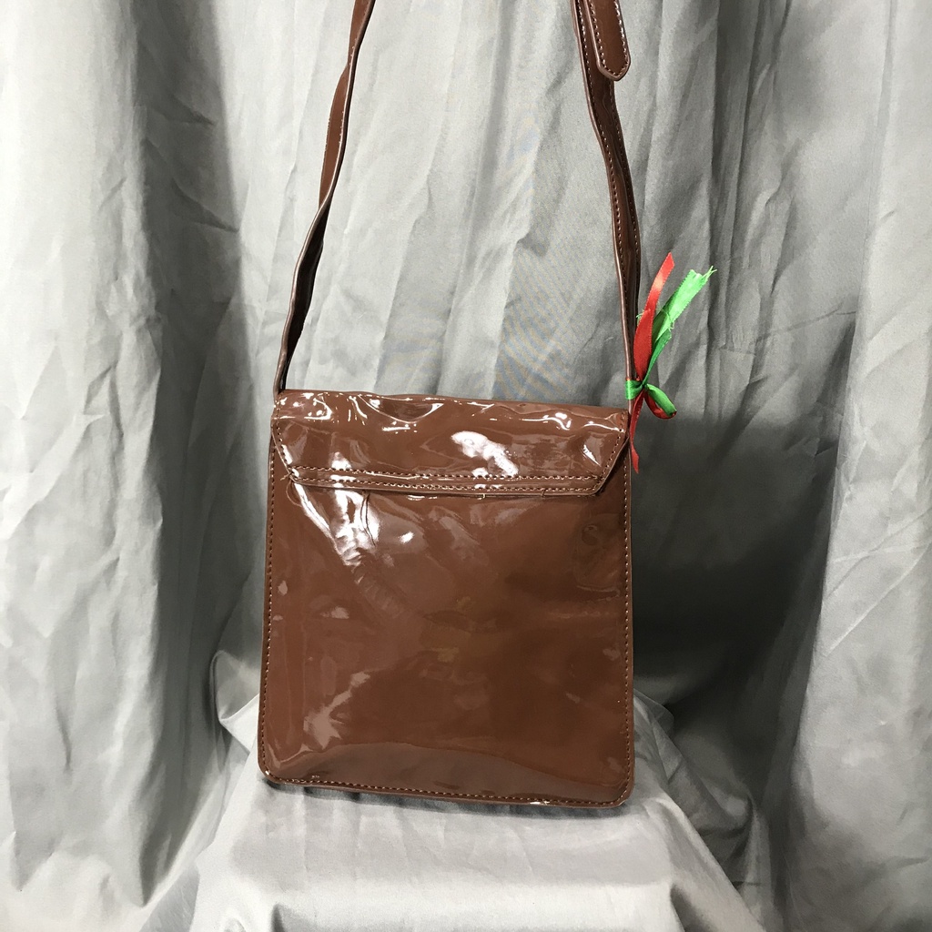 Túi xách si nhật màu nâu hiệu Casita