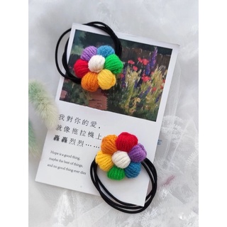 Cột tóc len mẫu hoa