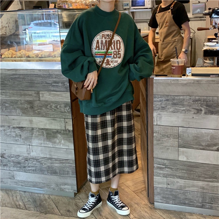 Set áo sweater cổ tròn dài tay + chân váy kẻ sọc caro thời trang cho nữ