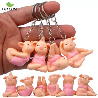 Móc treo chìa khóa chú heo tập yoga