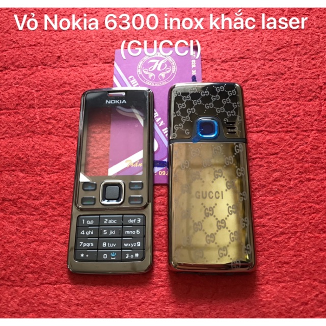 Vỏ Nokia 6300 inox màu carbon khắc laser Gucci bộ(mặt trước,mặt sau,khung sườn và bàn phím)