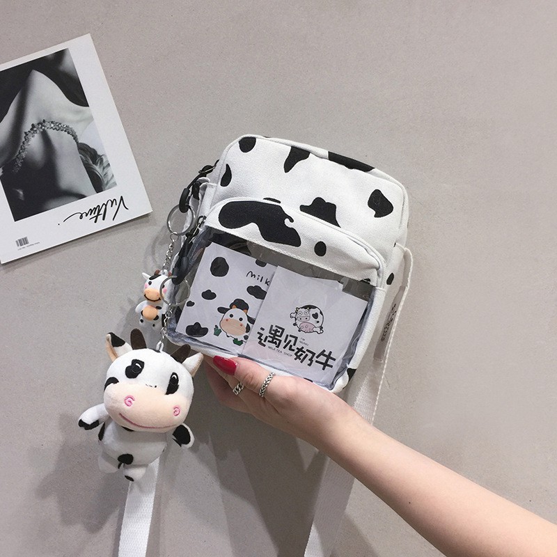 Túi đeo chéo mini con bò sữa hình vuông có ngăn trong suốt không kèm móc khóa