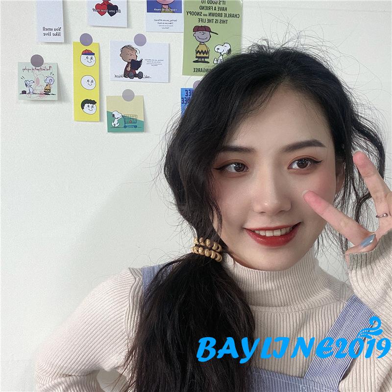 Dây buộc tóc co giãn màu trơn xoắn ốc không để lại dấu vết cho nữ