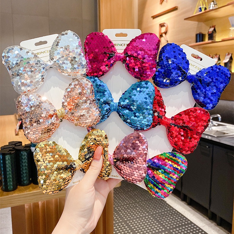 Kẹp tóc trang trí nơ đính sequin lấp lánh màu cầu vồng kiểu dáng thời trang cho bé gái