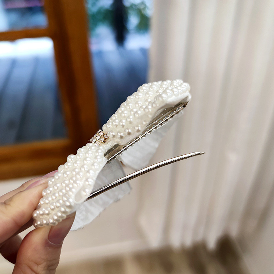 Kẹp tóc trang trí nơ nơ đính hạt ngọc trai phong cách Hàn Quốc