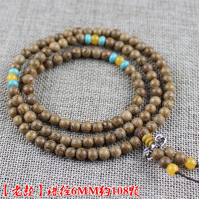 Vòng tay 108 hạt gỗ cánh gà phong cách phật giáo