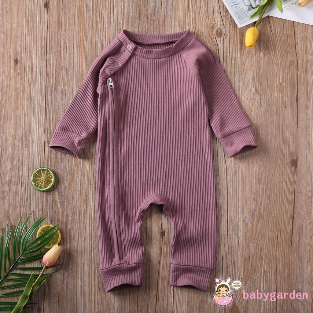 Bộ áo liền quần cổ tròn tay dài màu trơn cài nút phối khóa kéo thời trang cho bé