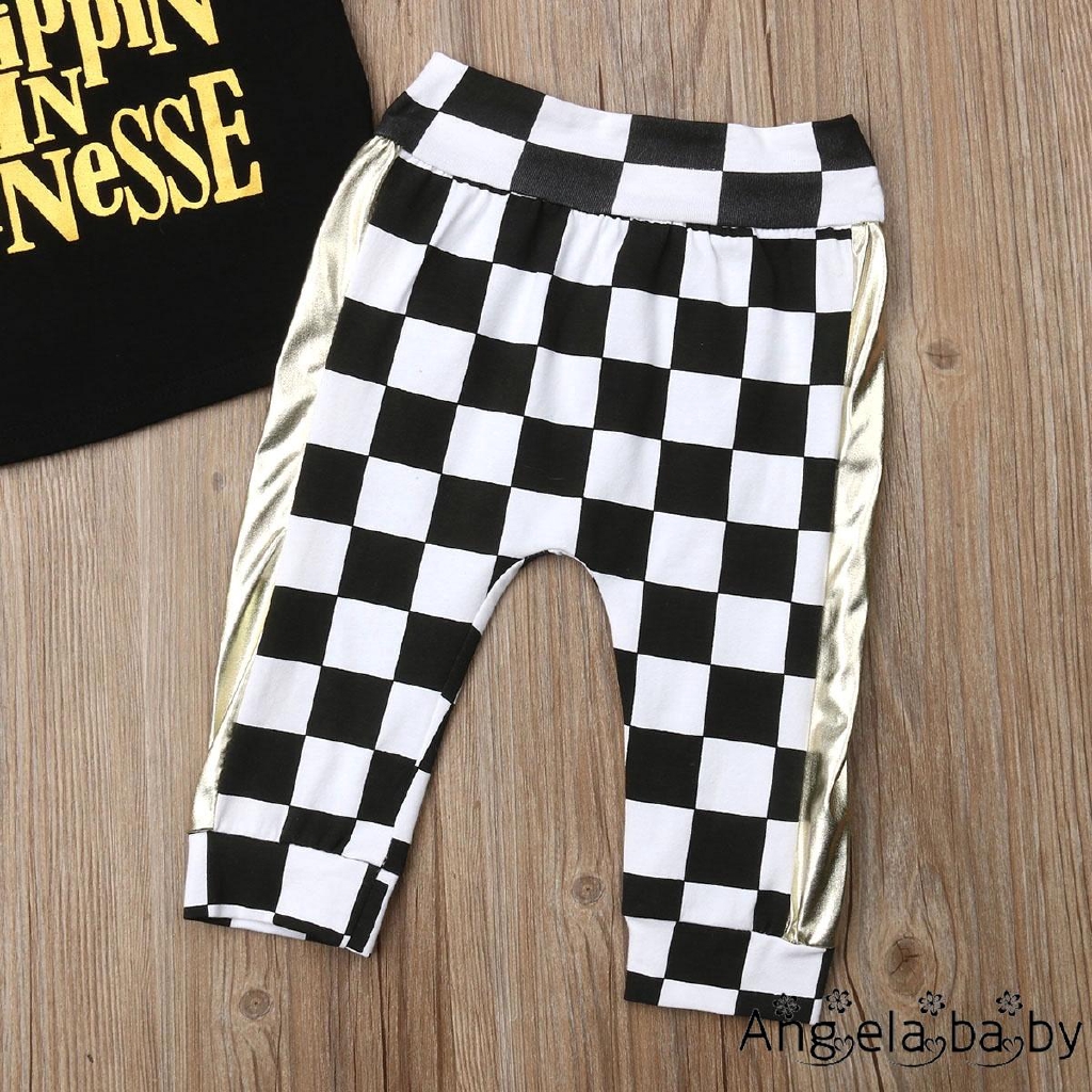 Set áo thun tay ngắn in chữ và quần legging họa tiết ca rô dễ thương cho bé