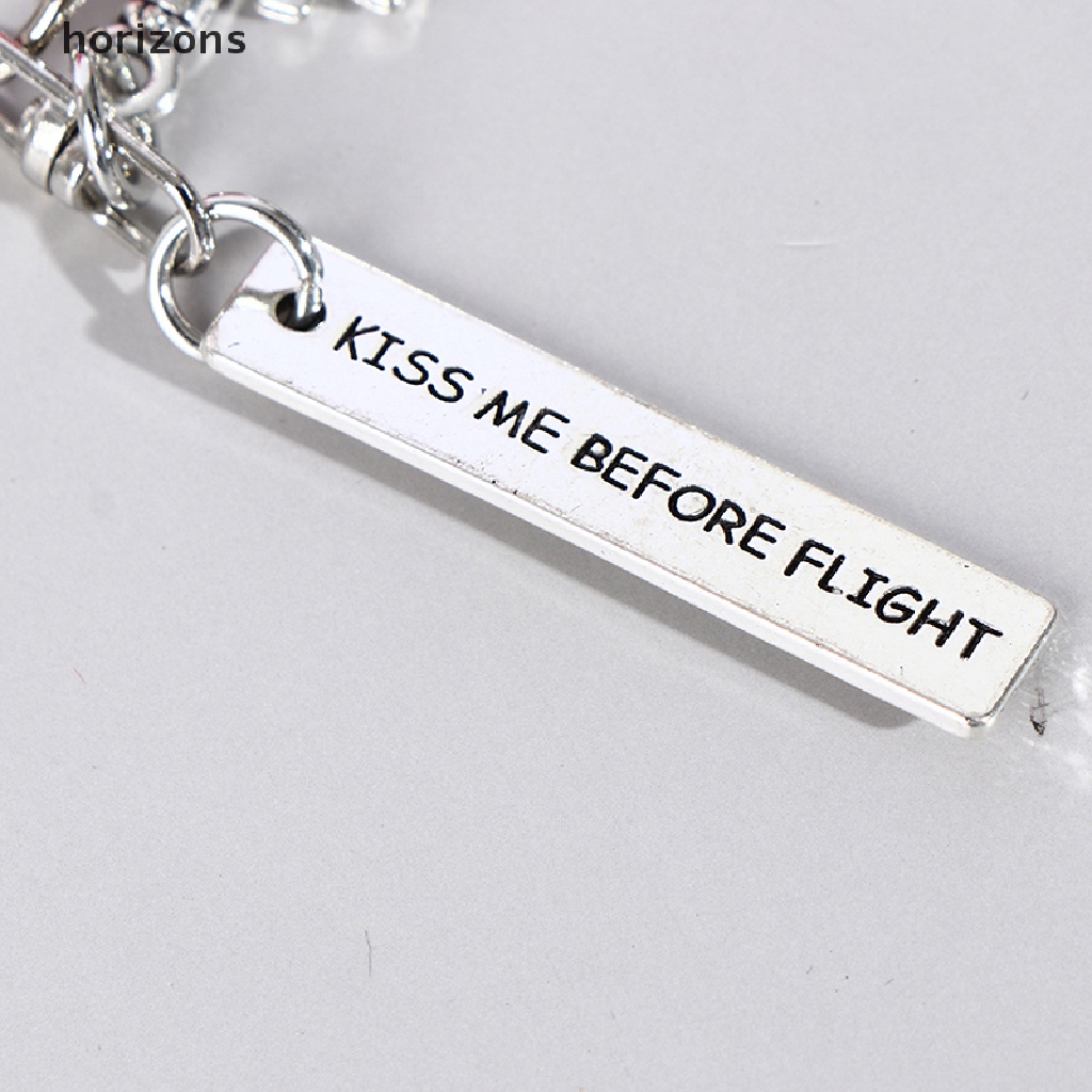 Móc khóa kim loại thẻ vải Kiss Me Before Flight
