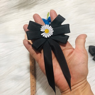 Cài áo nơ cúc hoạ mi. kt 6 x 13cm