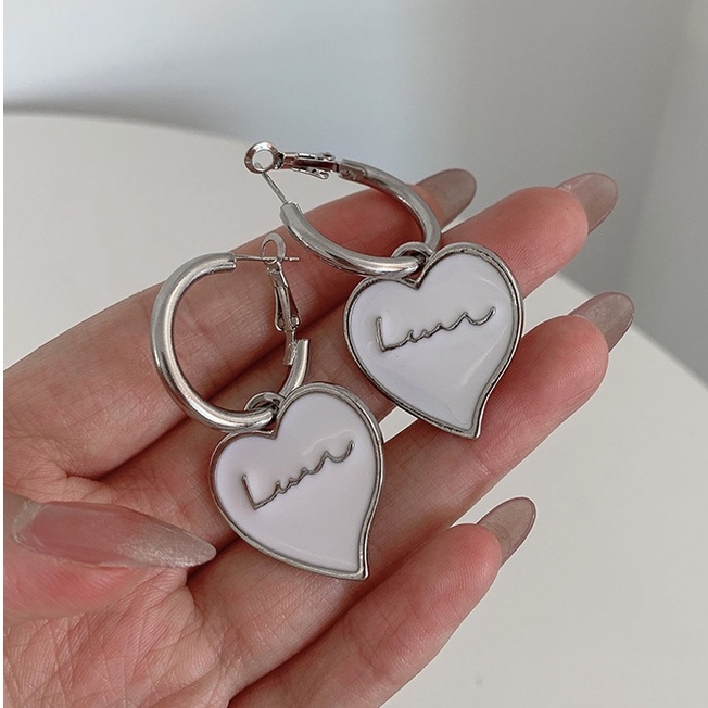 Bông tai dài hình nơ tua rua đơn giản