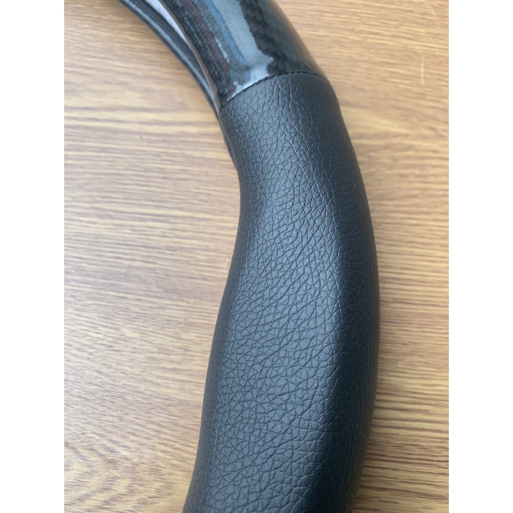 Bọc vô lăng Cacbon CAO CẤP có logo hãng xe