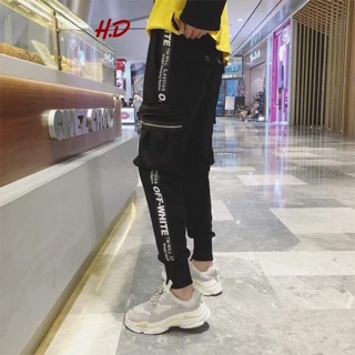 Quần off white khoá túi