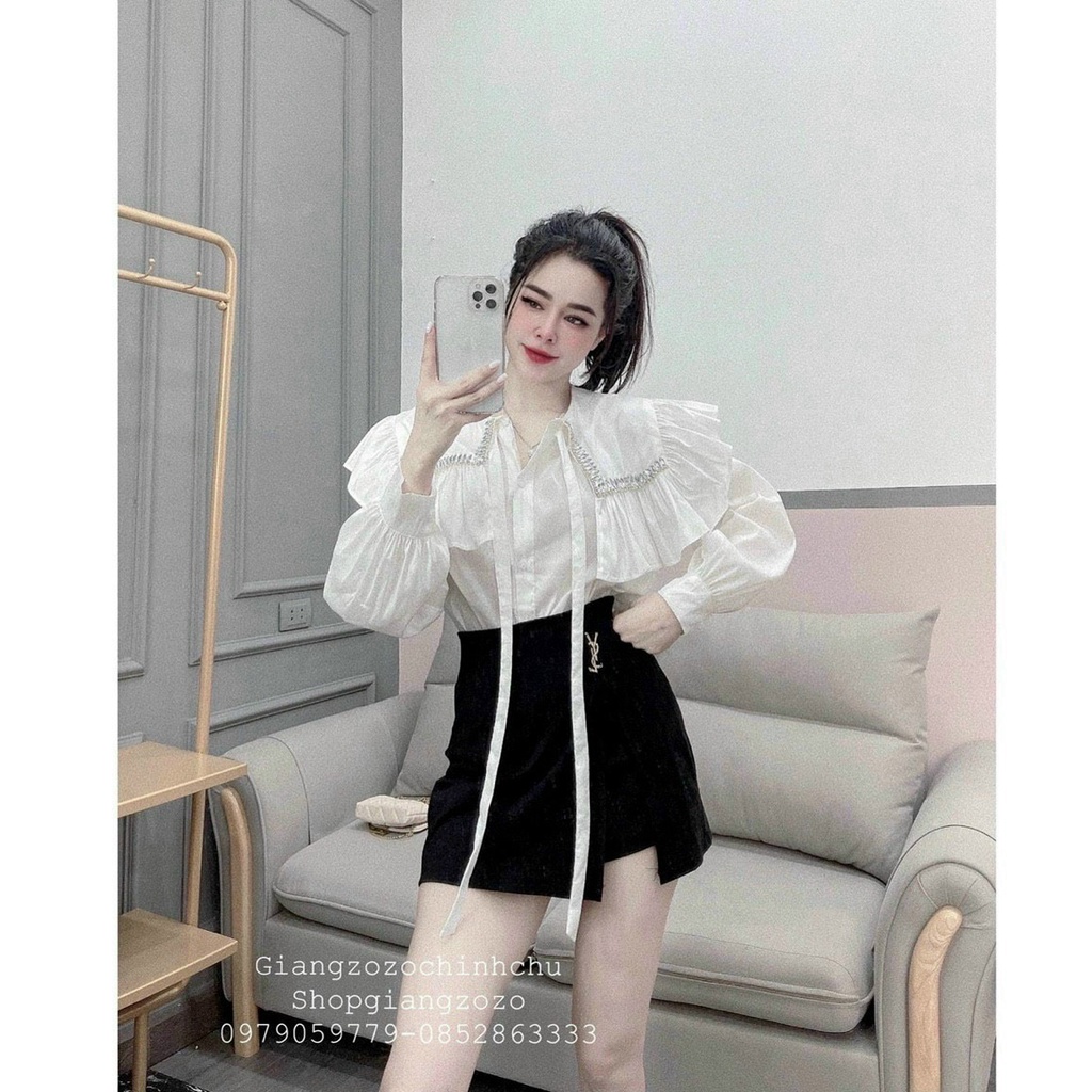 Chân váy chữ A đính cúc hoa chất sịn. Có quần lót trong bo chun không sợ lộ