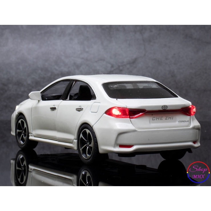 Xe đồ chơi mô hình sắt Toyota Corolla Altis TẶNG KÈM BIỂN SỐ tỉ lệ 1:32 hãng CheZhi