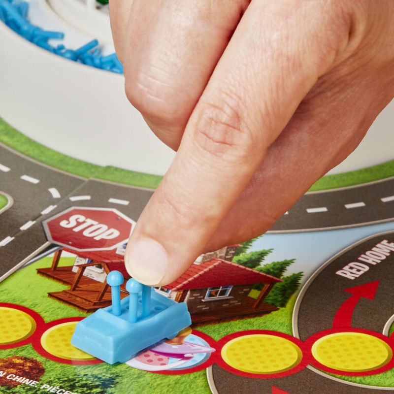 Trò chơi The Game of Life phiên bản con quay Pop o Matic Trouble game của Hasbro Game
