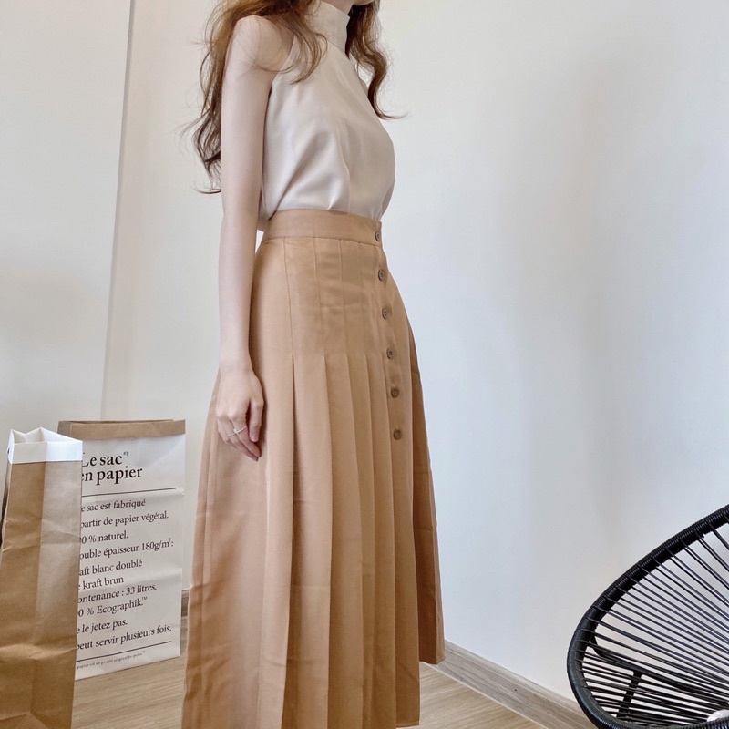 Chân váy xếp ly gài nút một bên ,chân váy midi công sở