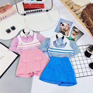 Set bộ áo kẻ kèm chân váy có quần trong