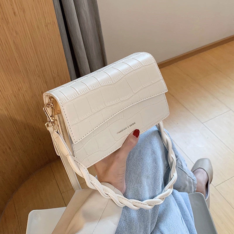 Túi kẹp nữ giá rẻ . Kiểu dáng korea mới kèm  dây đeo chéo