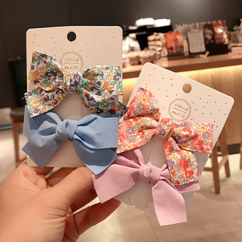 Bộ 2 Kẹp Tóc Đính Nơ Xinh Xắn Dành Cho Nữ