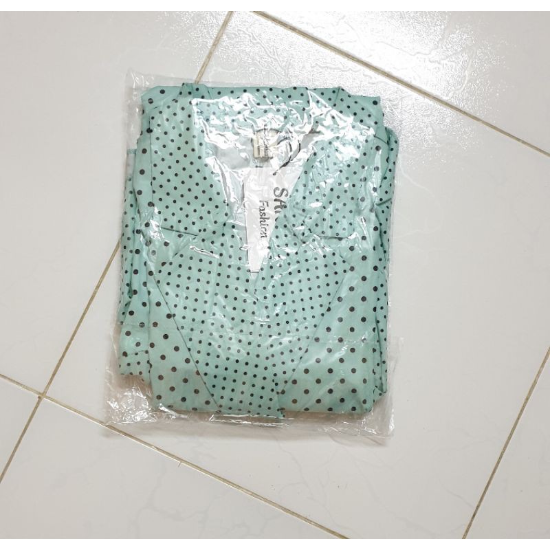 Đầm chấm bi xanh đuôi cá