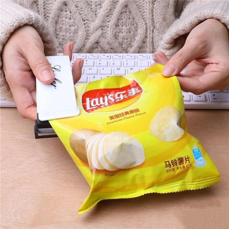 Máy Hàn Miệng Túi Mini Cầm Tay、 Máy hàn miệng túi thực phẩm kích cỡ mini tiện lợi