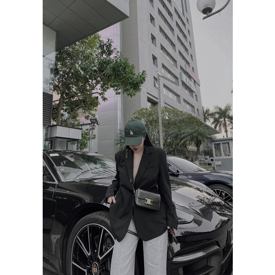 Áo vest xuông mai phương bùi