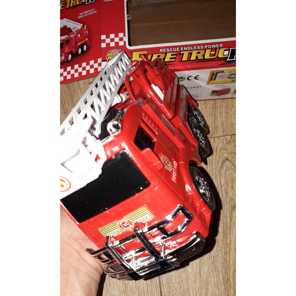 Xe mô hình xe thang cứu hộ bằng nhựa chạy pin có nhạc và đèn led rất đẹp-tặng kèm pin kích thước 20x18x8 cm