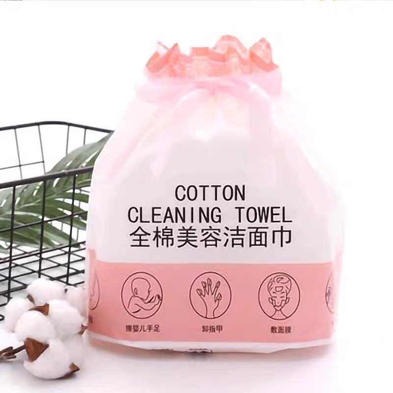 Khăn mặt khô dùng 1 lần lau khô, lau ướt , bông tẩy trang dạng cuộn kèm túi rút
