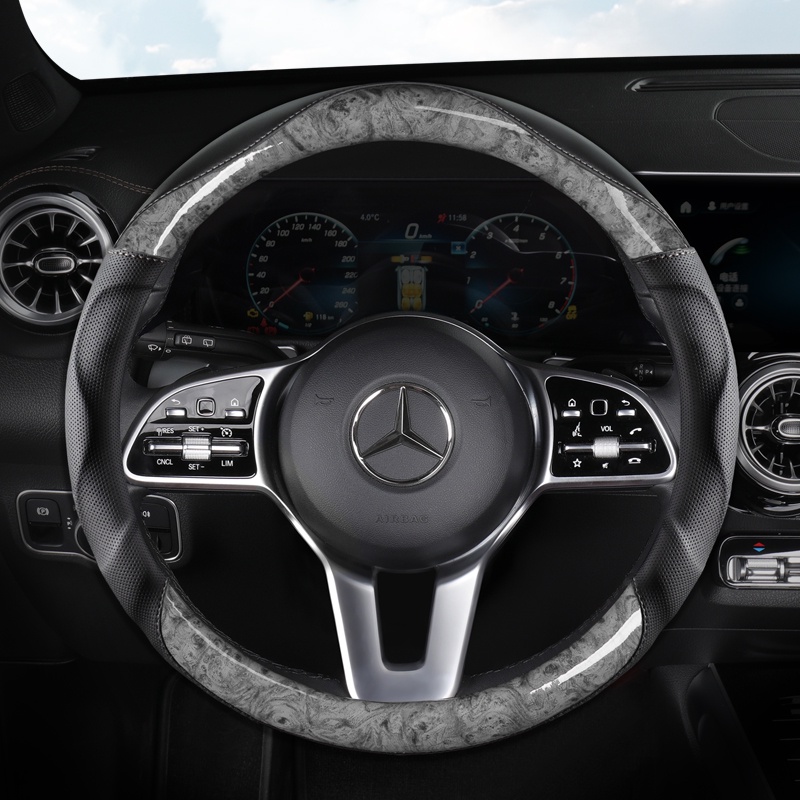 Vỏ Bọc Vô Lăng Xe Hơi Bằng Sợi Carbon Phối Da Cao Cấp