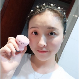 Cọ rửa mặt và massage bạch tuộc