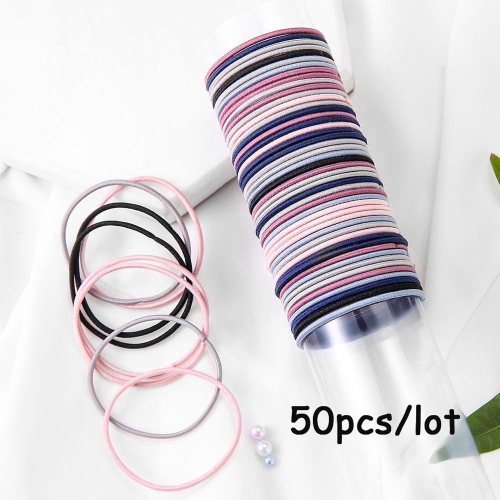 Set 50 dây buộc tóc cao su co giãn màu trơn cho nữ