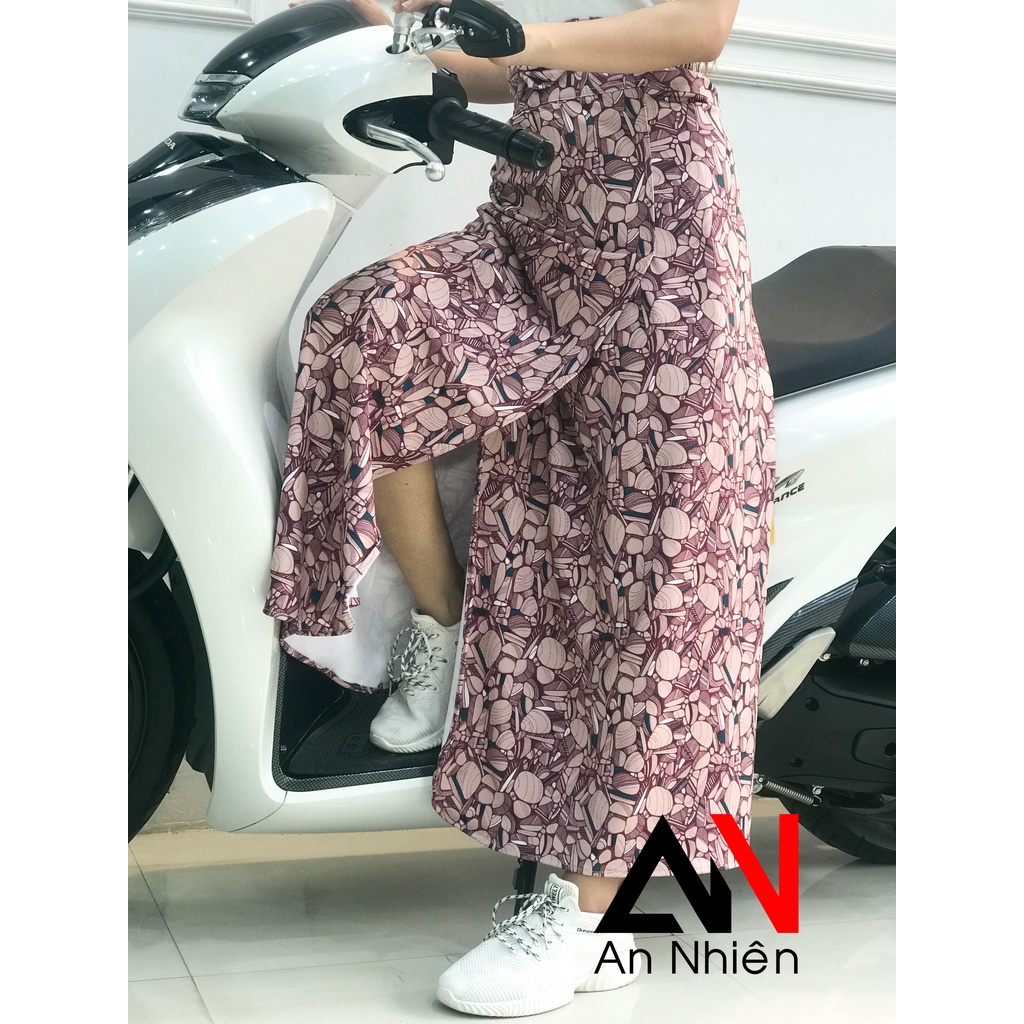 váy chống nắng xẻ tà có túi phía trước cố định bằng miếng dán kết hợp nút bấm - dưới chân váy có nút bấm