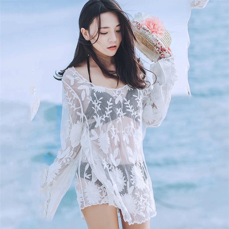 Spot sale white hollow loose see-through lace beach jacket mid-length long-sleeved sunscreen sexy swimsuit blouse single top