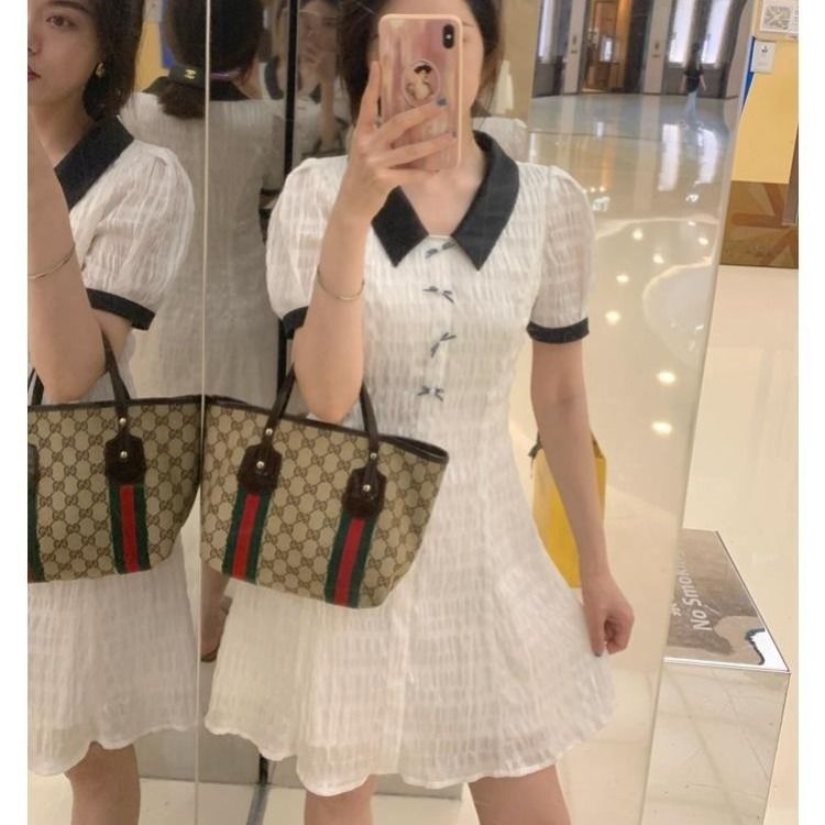 Đầm polo dáng dài ôm eo đính nơ xinh xắn cho nữ