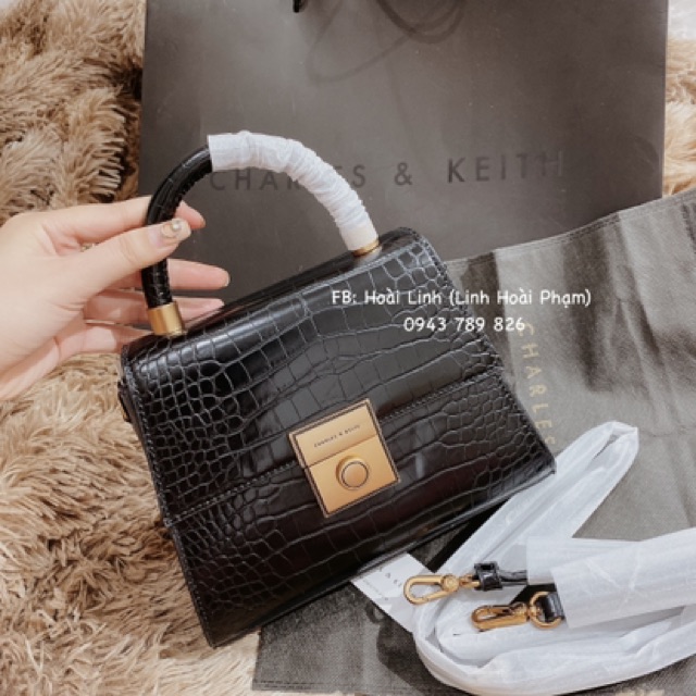 - Túi xách khuy tròn xuất dư