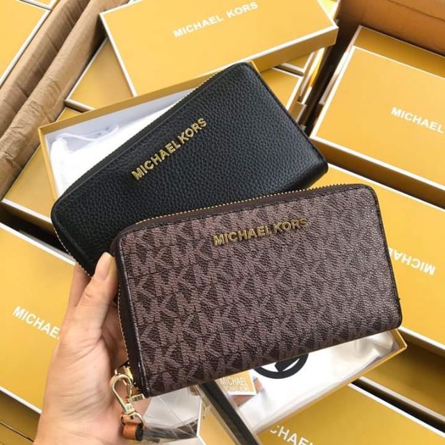Ví cầm tay michael kors