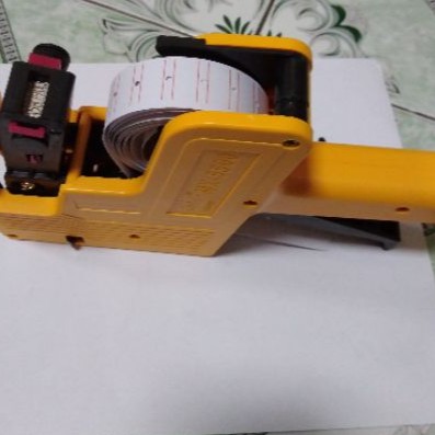 Máy bấm giá +10 cuộn giấy dán giá+ hộp mực