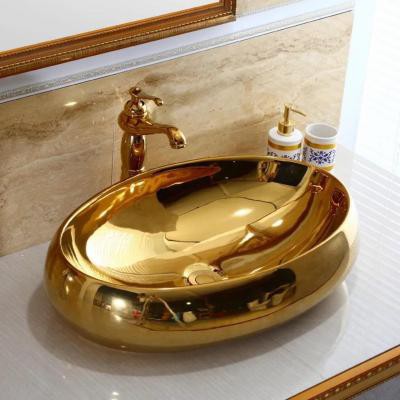 Chậu rửa lavabo elip mạ vàng cực đẹp với  độ bền cao thời gian sử dụng trên 20 năm .